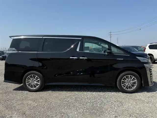 トヨタ ヴェルファイア ハイブリット ZR Gエディション 富山県 2020(令2)年 7万km ブラック 〇純正9インチディスプレイオーディオ/〇ナビキッド/〇フリップダウンモニター/〇バックカメラ/〇ビルトインETC/〇ドライブレコーダー/〇パワースライドドア（両側）/〇ツインムーンルーフ/〇セーフティセンス/〇レーダークルーズコントロール/〇プリクラッシュセーフティ/〇パワーバックドア/〇LEDヘッドランプ/〇オートライト/〇LEDフロントフォグランプ/〇純正17インチアルミ/〇木目調/革巻きコンビステアリングホイール/〇快適温熱シート/〇スマートエントリー/〇禁煙車