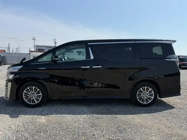 トヨタ ヴェルファイア ハイブリット ZR Gエディション 富山県 2020(令2)年 7万km ブラック 〇純正9インチディスプレイオーディオ/〇ナビキッド/〇フリップダウンモニター/〇バックカメラ/〇ビルトインETC/〇ドライブレコーダー/〇パワースライドドア（両側）/〇ツインムーンルーフ/〇セーフティセンス/〇レーダークルーズコントロール/〇プリクラッシュセーフティ/〇パワーバックドア/〇LEDヘッドランプ/〇オートライト/〇LEDフロントフォグランプ/〇純正17インチアルミ/〇木目調/革巻きコンビステアリングホイール/〇快適温熱シート/〇スマートエントリー/〇禁煙車