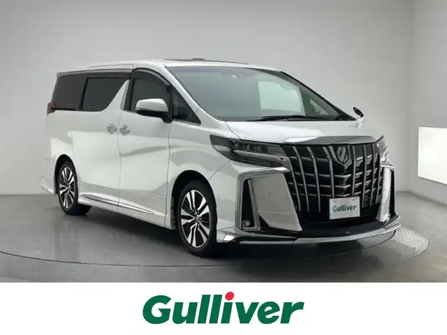 トヨタ アルファード S Cパッケージ 兵庫県 2023(令5)年 3.8万km ホワイトパールクリスタルシャイン サンルーフ/モデリスタスポイラー(F.S.R)/純正メモリナビ(CD/DVD/USB/フルセグ/Bluetooth/miracast)/純正フリップダウンモニター/バックカメラ/デジタルインナーミラー/ブラインドスポットモニター/パワーシート(D+N席)/シートヒーター(D+N席)/エアシート(D+N席)/ステアリングヒーター/レザーシート/両側パワースライドドア/パワーバックドア/純正18インチアルミホイール/社外フロアマット/コーナーセンサー/オートライト/オートマチックハイビーム/レーンキープアシスト/ビルトインETC/LEDヘッドライト/LEDフォグライト/OPスペアタイヤ