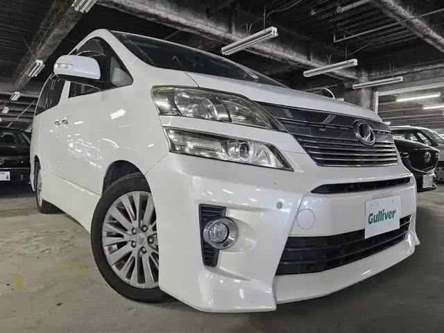 トヨタ ヴェルファイア 2．4Z 島根県 2012(平24)年 7.5万km ホワイトパールクリスタルシャイン 〇純正ナビ/〇フルセグTV/〇両側パワースライドドア/〇バックカメラ/〇ビルトインETC/〇SRSエアバッグ/〇オートライト/〇左右独立温度調整オートエアコン/〇ディンプル革巻きステアリングホイール/〇ダークグレートリコットシート/〇純正18インチアルミホイール/〇クリアランスソナー/〇スマートエントリー/〇禁煙車