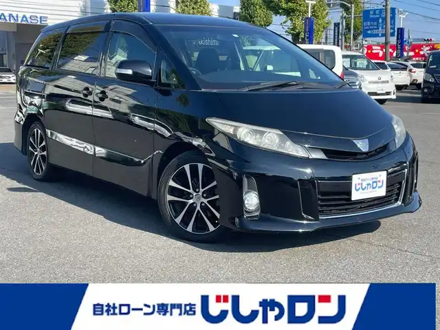 トヨタ エスティマ アエラス 東京都 2013(平25)年 8.7万km ブラック (株)IDOMが運営する【じしゃロン昭島店】の自社ローン専用車両になります。こちらは現金またはオートローンご利用時の価格です。自社ローンご希望の方は別途その旨お申付け下さい/ディーラーOPナビ/BT/SD/CD/DVD/フルセグTV/バックカメラ/エンジンスタートボタン/純正ETC/両側パワースライドドア/スマートキー/電動格納ミラー/純正フロアマット