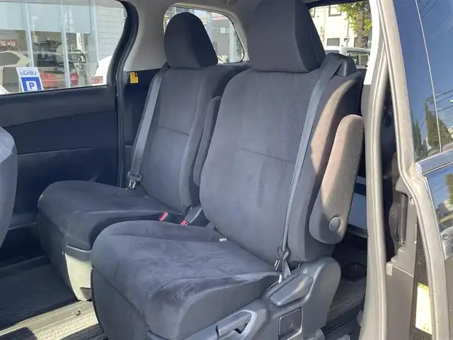 トヨタ エスティマ アエラス 東京都 2013(平25)年 8.7万km ブラック (株)IDOMが運営する【じしゃロン昭島店】の自社ローン専用車両になります。こちらは現金またはオートローンご利用時の価格です。自社ローンご希望の方は別途その旨お申付け下さい/ディーラーOPナビ/BT/SD/CD/DVD/フルセグTV/バックカメラ/エンジンスタートボタン/純正ETC/両側パワースライドドア/スマートキー/電動格納ミラー/純正フロアマット