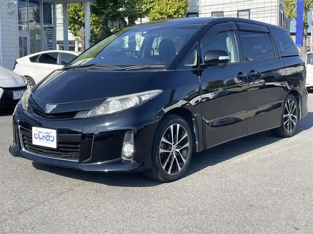 トヨタ エスティマ アエラス 東京都 2013(平25)年 8.7万km ブラック (株)IDOMが運営する【じしゃロン昭島店】の自社ローン専用車両になります。こちらは現金またはオートローンご利用時の価格です。自社ローンご希望の方は別途その旨お申付け下さい/ディーラーOPナビ/BT/SD/CD/DVD/フルセグTV/バックカメラ/エンジンスタートボタン/純正ETC/両側パワースライドドア/スマートキー/電動格納ミラー/純正フロアマット