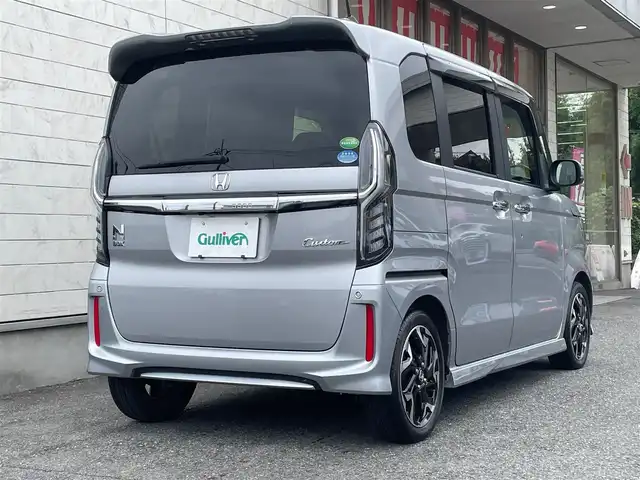 ホンダ Ｎ ＢＯＸ カスタム G L ターボ ホンダセンシング 埼玉県 2018(平30)年 1.2万km ルナシルバーM AIS検査済み/登録時走行11933キロ/車検R7年6月20日まで/ホンダセンシング/アダプティブクルーズコントロール/衝突被害軽減ブレーキ/車線維持支援システム/純正8インチSDナビ/フルセグTV/BT/CD/DVD/USB/バックカメラ/両側パワースライドドア/LEDヘッドライト/オートライト/ハーフレザーシート/パドルシフト/ドライブレコーダー/カーテンエアバック/スマートキー×2/ETC