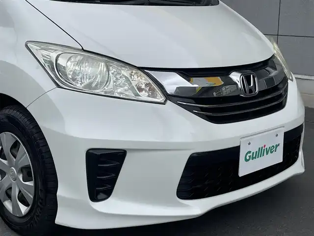 ホンダ フリード G プレミアムエディション 千葉県 2016(平28)年 8.4万km ホワイトオーキッドパール Gathersナビ/フルセグTV/Blue Tooth/CD/DVD/フリップダウンモニター/バックカメラ/前後ドライブレコーダー/両側パワスラドア/ビルトインETC/社外LEDヘッドライトバルブ/純正フロアマット/電動格納ミラー/ドアバイザー/取説/保証書