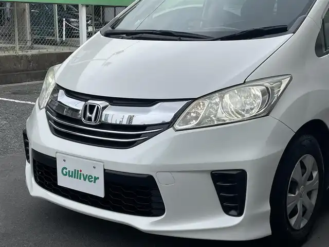 ホンダ フリード G プレミアムエディション 千葉県 2016(平28)年 8.4万km ホワイトオーキッドパール Gathersナビ/フルセグTV/Blue Tooth/CD/DVD/フリップダウンモニター/バックカメラ/前後ドライブレコーダー/両側パワスラドア/ビルトインETC/社外LEDヘッドライトバルブ/純正フロアマット/電動格納ミラー/ドアバイザー/取説/保証書
