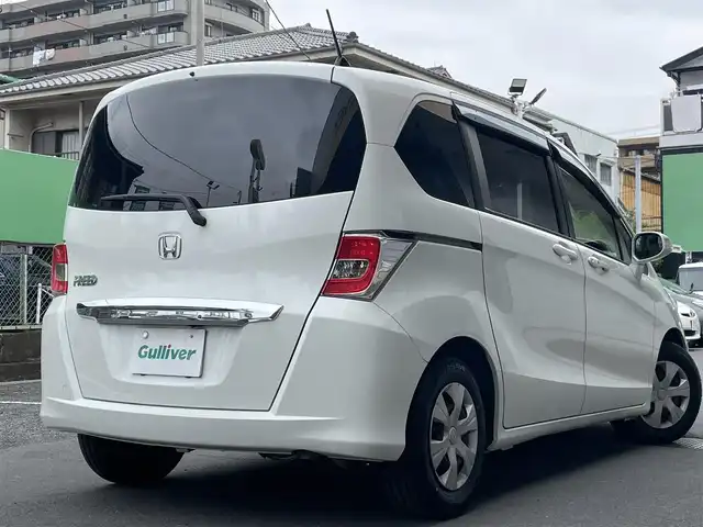 ホンダ フリード G プレミアムエディション 千葉県 2016(平28)年 8.4万km ホワイトオーキッドパール Gathersナビ/フルセグTV/Blue Tooth/CD/DVD/フリップダウンモニター/バックカメラ/前後ドライブレコーダー/両側パワスラドア/ビルトインETC/社外LEDヘッドライトバルブ/純正フロアマット/電動格納ミラー/ドアバイザー/取説/保証書