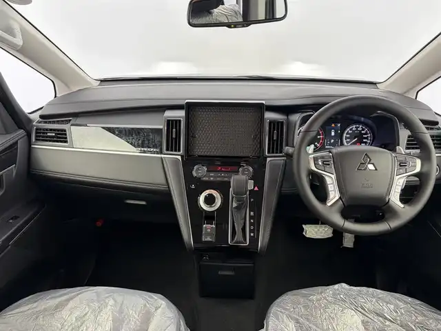 三菱 デリカＤ：５ シャモニー 愛知県 2025(令7)年 0.1千km 黒Ⅱ 登録済未使用車/4WD/ディーゼル/ターボ/e-Assist/  　・衝突軽減ブレーキシステム/　　・車線逸脱警報システム/　　・レーダークルーズコントロール/　　・オートマチックハイビーム/　　・BSM/マルチアラウンドモニター/革巻きステアリング/パドルシフト/ステアリングヒーター/ハーフレザーシート/パワーシート/シートヒーター/キャプテンシート/両側パワースライドドア/パワーバックドア/純正LEDヘッドライト/フォグランプ/純正18インチアルミホイール/取扱説明書/保証書/スペアキー