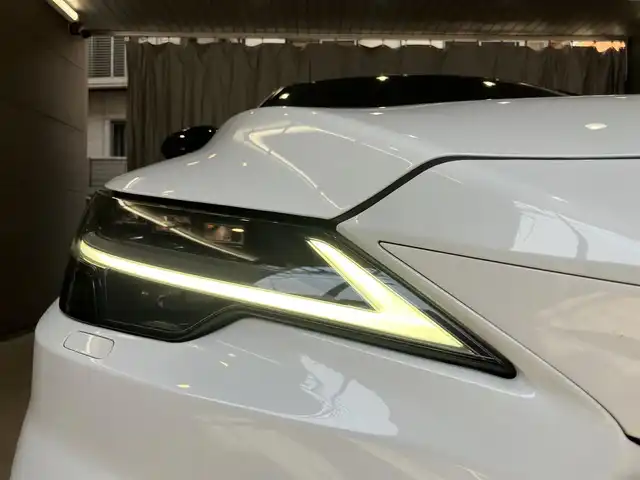 レクサス ＲＸ 500h Fスポーツパフォーマンス 東京都 2023(令5)年 2.3万km ホワイトノーヴァガラスフレーク ワンオーナー/セーフティシステムプラス/・プリクラッシュセーフティ/・レーンディパーチャーアラート/・レーントレーシングアシスト/・レーンチェンジアシスト/・レーダークルーズコントロール/・ロードサインアシスト/・発進遅れ告知機能/・ドライバー異常時対応システム/・ドライバーモニター連携/・フロントクロストラフィックアラート/14インチタッチディスプレイオーディオ/・車載コネクティッドナビ/・音声対話サービス/・地デジTV/・Apple CarPlay・Android auto/・USB端子/レクサスチームメイト/ブラインドスポットモニター/パーキングサポートブレーキ/パノラマビューモニター/パノラマルーフ/おくだけ充電/パドルシフト/3連フルLEDヘッドライト/デジタルインナーミラー/ドライブレコーダー前後/レザーシート　・シートヒーター ・ベンチレーション/ハンズフリーパワーバックドア/スマートキー　・スペアキー有/アクセサリーコンセント AC100W/ビルトインETC/保証書/ディーラー記録簿