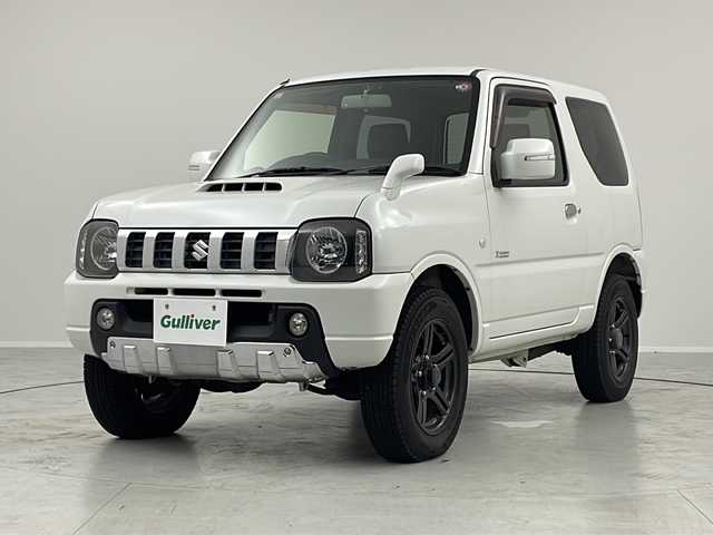 スズキ ジムニー クロスアドベンチャー 茨城県 2012(平24)年 4.9万km パールホワイト ターボ車　ＳＤナビ　シートヒーター　ヘッドライトレベライザー　ＥＴＣ　純正フロアマット　純正シート　背面タイヤ　ハロゲンヘッドライト　背面タイヤカバー　純正アルミホイール　電動格納ミラー　禁煙車