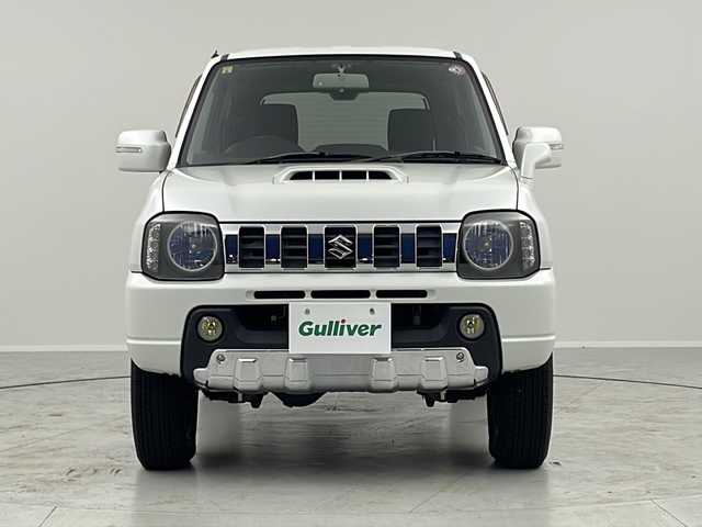 スズキ ジムニー クロスアドベンチャー 茨城県 2012(平24)年 4.9万km パールホワイト ターボ車　ＳＤナビ　シートヒーター　ヘッドライトレベライザー　ＥＴＣ　純正フロアマット　純正シート　背面タイヤ　ハロゲンヘッドライト　背面タイヤカバー　純正アルミホイール　電動格納ミラー　禁煙車