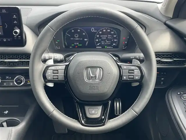 ホンダ ＺＲ－Ｖ ハイブリッド e:HEV Z 滋賀県 2025(令7)年 0.2万km クリスタルブラックパール 純正ナビ/・AM/FM/・USB/Bluetooth/・AppleCarPlay/・AndroidAuto/・フルセグTV/マルチビューカメラ/ステアリングスイッチ/革巻きステアリング/ステアリングヒーター/パドルシフト/ビルトインETC2.0/ワイヤレス充電/衝突軽減ブレーキ/レーンキープアシスト/先行者発進お知らせ/ブラインドスポットシステム/アダプティブクルーズコントロール/標識認識機能/ドライバー注意力モニター/ヒルディセントコントロール/パワーテールゲート/前席パワーシート/運転席メモリシート/前席シートヒーター/電動格納ミラー/オートマチックヘッドライト/LEDヘッドライト/アダプティブヘッドライトシステム/純正18インチアルミホイール