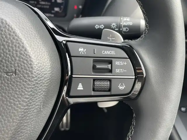 ホンダ ＺＲ－Ｖ ハイブリッド e:HEV Z 滋賀県 2025(令7)年 0.2万km クリスタルブラックパール 純正ナビ/・AM/FM/・USB/Bluetooth/・AppleCarPlay/・AndroidAuto/・フルセグTV/マルチビューカメラ/ステアリングスイッチ/革巻きステアリング/ステアリングヒーター/パドルシフト/ビルトインETC2.0/ワイヤレス充電/衝突軽減ブレーキ/レーンキープアシスト/先行者発進お知らせ/ブラインドスポットシステム/アダプティブクルーズコントロール/標識認識機能/ドライバー注意力モニター/ヒルディセントコントロール/パワーテールゲート/前席パワーシート/運転席メモリシート/前席シートヒーター/電動格納ミラー/オートマチックヘッドライト/LEDヘッドライト/アダプティブヘッドライトシステム/純正18インチアルミホイール