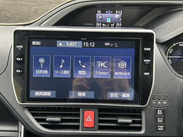 トヨタ ヴォクシー ハイブリッド ZS 煌Ⅲ 愛知県 2020(令2)年 3.2万km ブラック 登録時走行距離31726ｋｍ/純正１０インチメモリナビ/（Bluetooth/フルセグTV/DVD/AM/FM)/バックカメラ/ドラレコ前/インテリジェントクリアランスソナー前後/トヨタセーフティーセンス/レーントーシングアシスト/プリクラッシュセーフティー/オートマッチハイビーム/先行車発進告知/クルーズコントロール/ビルドインETC/USB端子/両側パワースライドドア/ドアバイザー/オートライト/（LED)/電格ミラー/取説/保証書/スマートキー/（スペアキー×１）