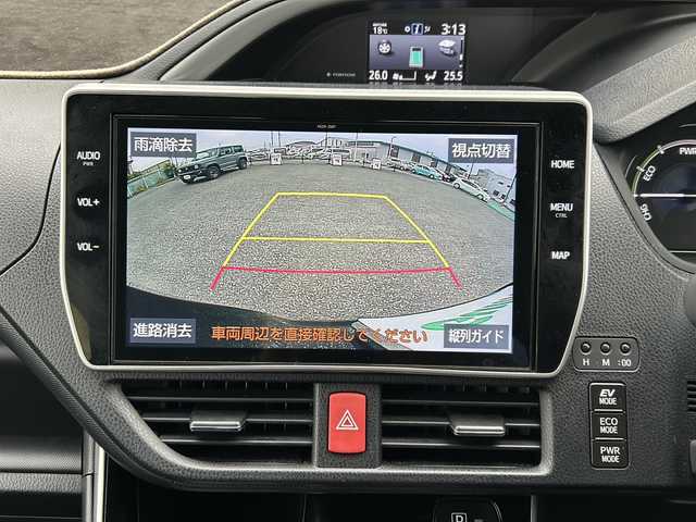 トヨタ ヴォクシー ハイブリッド ZS 煌Ⅲ 愛知県 2020(令2)年 3.2万km ブラック 登録時走行距離31726ｋｍ/純正１０インチメモリナビ/（Bluetooth/フルセグTV/DVD/AM/FM)/バックカメラ/ドラレコ前/インテリジェントクリアランスソナー前後/トヨタセーフティーセンス/レーントーシングアシスト/プリクラッシュセーフティー/オートマッチハイビーム/先行車発進告知/クルーズコントロール/ビルドインETC/USB端子/両側パワースライドドア/ドアバイザー/オートライト/（LED)/電格ミラー/取説/保証書/スマートキー/（スペアキー×１）