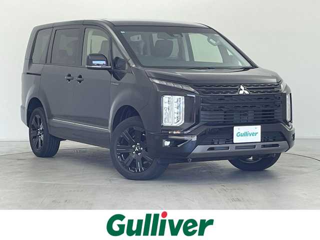 三菱 デリカＤ：５ シャモニー 群馬県 2025(令7)年 0.1千km 黒Ⅱ 登録済未使用車(登録時走行距離：13km)/オリジナルナビ取付パッケージ＋リアモニター取付パッケージ/＝＝＝＝＝/e-Assist(運転支援機能)/・衝突被害軽減ブレーキ(FCM)/・車線逸脱警報システム(LDW)/・レーダークルーズコントロール(ACC)/・オートマチックハイビーム(AHB)/・後側方車両検知警報システム(レーンチェンジアシスト機能付)/・誤発進抑制機能(前進時)/・後退時交差車両検知警報(RCTA)/両側パワースライドドア/エレクトリックテールゲート/ハーフレザーシート/前席シートヒーター/ステアリングヒーター/革巻きステアリング/ステアリングスイッチ/アイドリングストップ/電動パーキングブレーキ/オートブレーキホールド/プッシュスタート/スマートキー×2本/取扱説明書/保証書