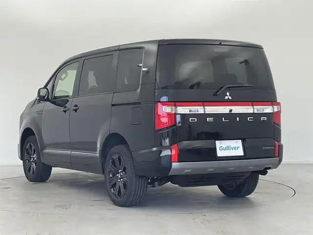 三菱 デリカＤ：５ シャモニー 群馬県 2025(令7)年 0.1千km 黒Ⅱ 登録済未使用車(登録時走行距離：13km)/オリジナルナビ取付パッケージ＋リアモニター取付パッケージ/＝＝＝＝＝/e-Assist(運転支援機能)/・衝突被害軽減ブレーキ(FCM)/・車線逸脱警報システム(LDW)/・レーダークルーズコントロール(ACC)/・オートマチックハイビーム(AHB)/・後側方車両検知警報システム(レーンチェンジアシスト機能付)/・誤発進抑制機能(前進時)/・後退時交差車両検知警報(RCTA)/両側パワースライドドア/エレクトリックテールゲート/ハーフレザーシート/前席シートヒーター/ステアリングヒーター/革巻きステアリング/ステアリングスイッチ/アイドリングストップ/電動パーキングブレーキ/オートブレーキホールド/プッシュスタート/スマートキー×2本/取扱説明書/保証書