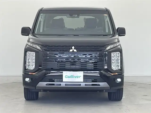 三菱 デリカＤ：５ シャモニー 群馬県 2025(令7)年 0.1千km 黒Ⅱ 登録済未使用車(登録時走行距離：13km)/オリジナルナビ取付パッケージ＋リアモニター取付パッケージ/＝＝＝＝＝/e-Assist(運転支援機能)/・衝突被害軽減ブレーキ(FCM)/・車線逸脱警報システム(LDW)/・レーダークルーズコントロール(ACC)/・オートマチックハイビーム(AHB)/・後側方車両検知警報システム(レーンチェンジアシスト機能付)/・誤発進抑制機能(前進時)/・後退時交差車両検知警報(RCTA)/両側パワースライドドア/エレクトリックテールゲート/ハーフレザーシート/前席シートヒーター/ステアリングヒーター/革巻きステアリング/ステアリングスイッチ/アイドリングストップ/電動パーキングブレーキ/オートブレーキホールド/プッシュスタート/スマートキー×2本/取扱説明書/保証書