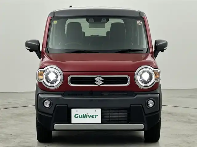 スズキ ハスラー HYBRID X 福岡県 2023(令5)年 0.1万km フェニックスレッドパール/ガンメタリック2トーンルーフ 純正９型ナビ（ＢＴ，フルセグＴＶ）　/全方位カメラ　/アダプティブクルーズコントロール　/コーナーセンサー　/衝突軽減ブレーキ　/レーンキープ　/アイドリングストップ　/シートヒーター　/ステアリングリモコン　/ＬＥＤ