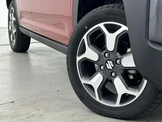 スズキ ハスラー HYBRID X 福岡県 2023(令5)年 0.1万km フェニックスレッドパール/ガンメタリック2トーンルーフ 純正９型ナビ（ＢＴ，フルセグＴＶ）　/全方位カメラ　/アダプティブクルーズコントロール　/コーナーセンサー　/衝突軽減ブレーキ　/レーンキープ　/アイドリングストップ　/シートヒーター　/ステアリングリモコン　/ＬＥＤ