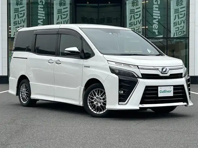 トヨタ ヴォクシー ハイブリッド ZS 煌Ⅱ 岡山県 2019(令1)年 8.2万km ホワイトパールクリスタルシャイン トヨタセーフティセンス/デジタルインナーミラー/アルパイン11インチナビ/アルパイン後席モニター/ＨＤＭＩ/バックモニター/ビルトインＥＴＣ/シートヒーター/両側パワースライドドア/クルーズコントロール/オートハイビーム/レーンキープアシスト/ドライブレコーダー