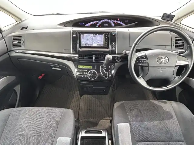 トヨタ エスティマ アエラス 岡山県 2015(平27)年 6.1万km アイスチタニウムマイカメタリック 登録時走行距離60414km/純正ナビ/（AM/FM/DISC/SD/TV/Bluetooth/DS)/純正フリップダウンモニター/前コーナーセンサー/クルーズコントロール/両側パワースライドドア/オットマン/バックカメラ/スペアキー×1/前ドライブレコーダー/プッシュスタート/スマートキー/レーダー探知機(ZERO 700v)/ビルトインETC/純正１８インチアルミホイール