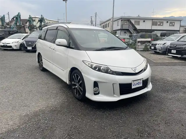 トヨタ エスティマ アエラス プレミアムエディション 神奈川県 2014(平26)年 9.9万km ホワイトパールクリスタルシャイン (株)IDOMが運営する【じしゃロン秦野店】の自社ローン専用車両になりますこちらは現金またはオートローンご利用時の価格です。自社ローンご希望の方は別途その旨お申付け下さい/純正ナビ/バックカメラ/Bluetooth接続/ビルドインETC/両側パワースライドドア/ハーフレザーシート/前方ドライブレコーダー