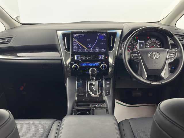 トヨタ ヴェルファイア Z Gエディション 愛知県 2019(令1)年 4.7万km ホワイトパールクリスタルシャイン 禁煙車/ALPINEヴェルファイア専用ナビ(EX11Z)/ALPINEヴェルファイア専用プラズマクラスター搭載リアビジョン(PXH12X-R-AV)/バックカメラ/ビルトインETC/ツインムーンルーフ/パワーバックドア/Z専用エアロ外装/3眼LEDヘッドランプ/オートライト/フロントフォグランプ/トヨタセーフティセンス/プリクラッシュセーフティ/レーントレーシングアシスト/レーダークルーズコントロール/ロードサインアシスト/アダプティブハイビームシステム/先行車発進告知/インテリジェントクリアランスソナー/パーキングサポートブレーキ(静止物)/両側ワンタッチパワースライドドア/黒合皮シート/前席パワーシート/前席快適温熱シート&ベンチレーション/運転席ポジションメモリー/助手席パワーオットマン/2列目エグゼクティブパワーシート/3列目スペースアップシート/メタルウッド&スパッタリング内装/本革&メタルウッドステアリング/ステアスイッチ/ステアヒーター/電子パーキングブレーキ/ブレーキホールド/プッシュスタート/電動格納ミラーウィンカー/新車保証書・取扱説明書