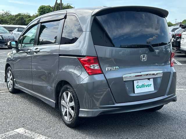 ホンダ フリード Giエアロ 千葉県 2009(平21)年 16.2万km ポリッシュドメタルメタリック ＡＶＩＣ－ＲＺ０６ナビ　Ｂカメ　ＥＴＣ　フリップダウンモニター ワンセグTV Bt DVD 両側パワースライドドア ハロゲンライト オートライト 15インチAW エアバッグ セキュリティパッケージ