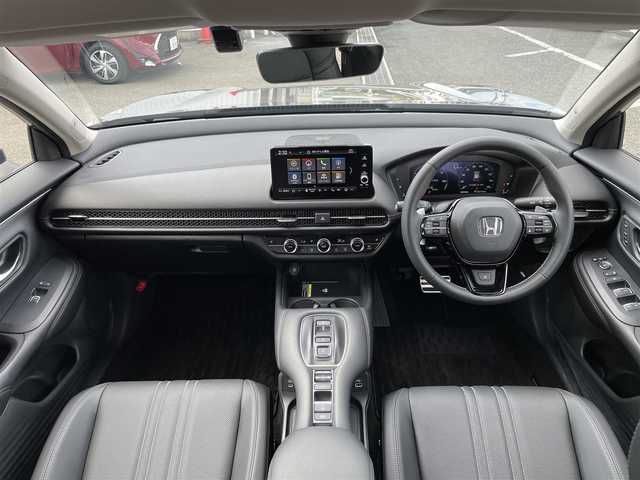 ホンダ ＺＲ－Ｖ ハイブリッド e:HEV Z 東京都 2025(令7)年 0.2万km グレー 純正９型ナビ/・AM/FM/フルセグ/BOSEサウンドシステム/アラウンドビューモニター/前席シートヒーター/運転席メモリパワーシート/・前席パワーシート/ブラインドスポットモニター/前後ドライブレコーダー/おくだけ充電/ステアリングヒーター/LEDヘッドランプ/ホンダセンシング/（予防運転支援システム）/・衝突軽減ブレーキ/・後方誤発進抑制機能/・歩行者事故低減ステアリング/・追従機能付きクルーズコントロール/・車線維持支援システム/・標識認識機能/・後退時出庫サポート/・パーキングセンサーシステム/プッシュエンジンスタート/純正フロアマット/スマートキー