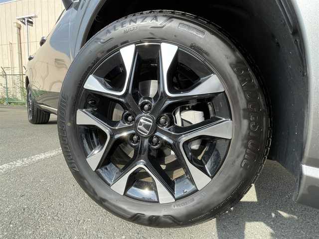 ホンダ ＺＲ－Ｖ ハイブリッド e:HEV Z 東京都 2025(令7)年 0.2万km グレー 純正９型ナビ/・AM/FM/フルセグ/BOSEサウンドシステム/アラウンドビューモニター/前席シートヒーター/運転席メモリパワーシート/・前席パワーシート/ブラインドスポットモニター/前後ドライブレコーダー/おくだけ充電/ステアリングヒーター/LEDヘッドランプ/ホンダセンシング/（予防運転支援システム）/・衝突軽減ブレーキ/・後方誤発進抑制機能/・歩行者事故低減ステアリング/・追従機能付きクルーズコントロール/・車線維持支援システム/・標識認識機能/・後退時出庫サポート/・パーキングセンサーシステム/プッシュエンジンスタート/純正フロアマット/スマートキー