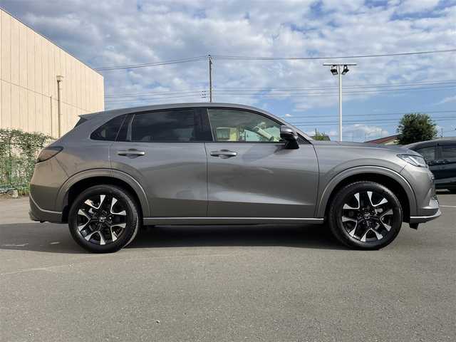 ホンダ ＺＲ－Ｖ ハイブリッド e:HEV Z 東京都 2025(令7)年 0.2万km グレー 純正９型ナビ/・AM/FM/フルセグ/BOSEサウンドシステム/アラウンドビューモニター/前席シートヒーター/運転席メモリパワーシート/・前席パワーシート/ブラインドスポットモニター/前後ドライブレコーダー/おくだけ充電/ステアリングヒーター/LEDヘッドランプ/ホンダセンシング/（予防運転支援システム）/・衝突軽減ブレーキ/・後方誤発進抑制機能/・歩行者事故低減ステアリング/・追従機能付きクルーズコントロール/・車線維持支援システム/・標識認識機能/・後退時出庫サポート/・パーキングセンサーシステム/プッシュエンジンスタート/純正フロアマット/スマートキー