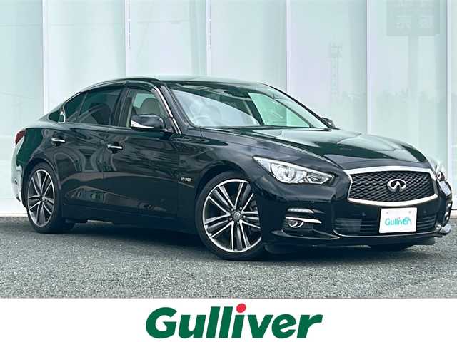 日産 スカイライン ハイブリッド 350GT Type P 福岡県 2017(平29)年 9.1万km スーパーブラック ・純正メーカーナビ/-BT/フルセグTV/CD/DVD/FM/AM/・全方位カメラ/・運転席メモリーシート/・レーダークルーズコントロール/・車線逸脱防止支援システム/・電動チルト＆テレスコピックステアリング/・クリアランスソナー/・前席パワーシート/・前席シートヒーター/・純正フロアマット/・純正アルミ19インチ/・ウィンカーミラー/・電動格納ミラー/・ドアバイザー/・オートライト/・ビルトインETC/・スマートキー/・スペアキー