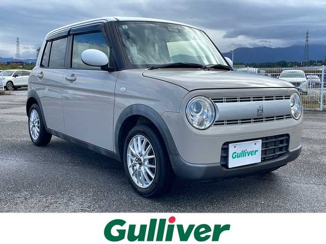 スズキ ラパン S 富山県 2019(令1)年 8.4万km フォーンベージュメタリック/ホワイト2トーンルーフ 禁煙車/バックカメラ/社外ナビ/電動格納ミラー/キセノンヘッドランプ（HID）/スマートキー/シートヒーター（運転席）/アイドリングストップ/ETC/プッシュスタート/純正フロアマット/本革巻きステアリング/盗難防止装置/衝突軽減システム/横滑り防止装置/ウッドパネル