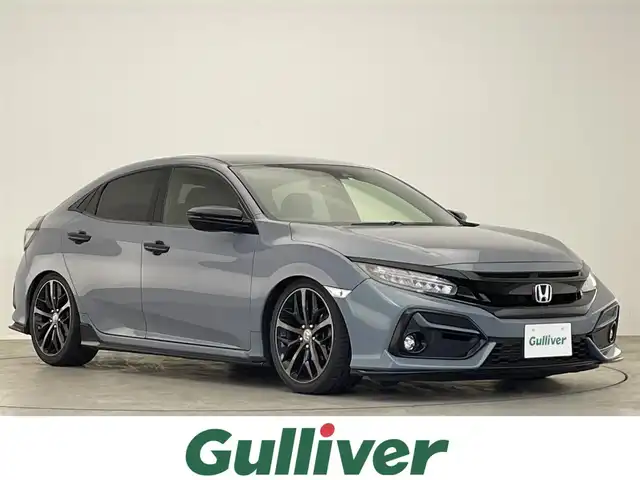ホンダ シビック ハッチバック 滋賀県 2020(令2)年 5.2万km ソニックグレーパール 禁煙車/純正ナビ/（CD/DVD/BT/AM/FM/SD/USB/AUX/フルセグTV）/RSR車高調/前後ドライブレコーダー/ホンダセンシング/・レーダークルーズコントロール/・衝突被害軽減ブレーキ/・レーンキープアシスト/・先行車発進お知らせ/・オートハイビーム/運転席・助手席パワーシート/運転席・助手席シートヒーター/電動パーキング/オートホールド/ステアリングスイッチ/アイドリングストップ/オートライト/パドルシフト/フォグランプ/オートエアコン