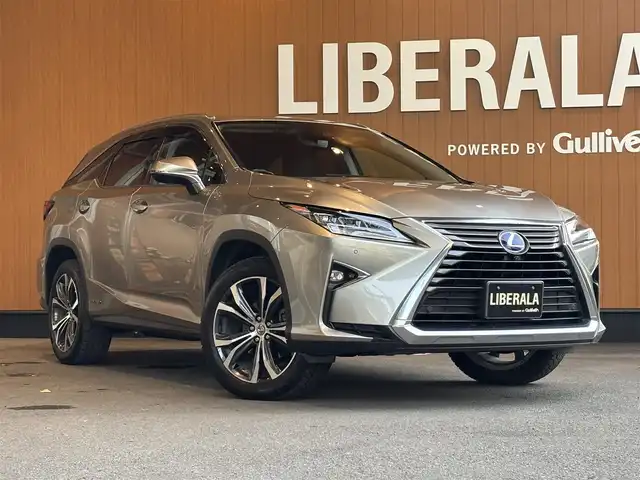 レクサス ＲＸ 450hL 宮城県 2018(平30)年 7.9万km ソニックチタニウム LSS+/HUD/純正ナビ/全周囲カメラ/フルセグTV/黒革シート/シートヒーター/エアシート/シートヒーター/アイドリングストップ/ACC/BSM/パワーバクドア/三眼LEDヘッドライト/オートマティックハイビーム/電動パーキング/オートホールド/純正20インチAW