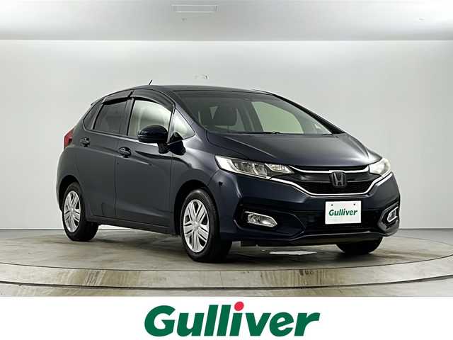 ホンダ フィット 13G L ホンダセンシング 愛知県 2017(平29)年 4.4万km ミッドナイトブルービームM 純正7型ナビ【Bluetooth CD DVD SD 品番：VXM-184VF】/バックカメラ/ドライブレコーダー/ホンダセンシング/・衝突軽減ブレーキ/・路外逸脱抑制機能/・先行車発進お知らせ/・アダプティブクルーズコントロール/・車線維持支援システム/・標識認識機能/横滑り防止装置/ECON/ステアリングリモコン/ドアバイザー/純正フロアマット/禁煙車
