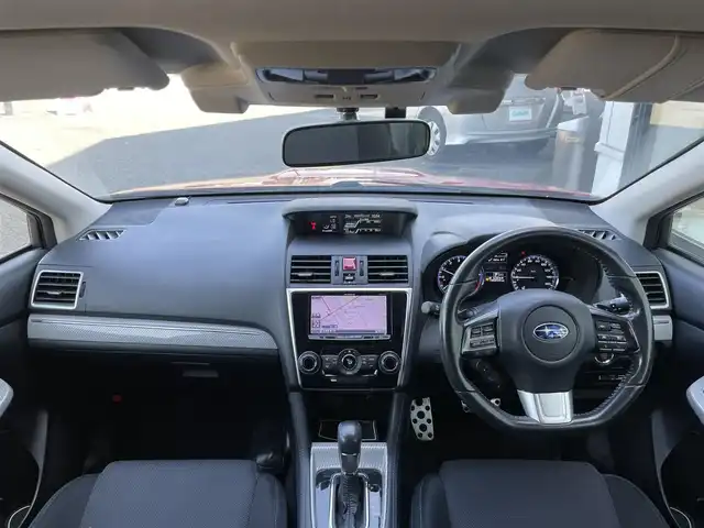 スバル レヴォーグ 1．6GT－S アイサイト 道央・札幌 2014(平26)年 10.1万km ライトニングレッド ４WD/社外メモリーナビ/CD/DVD/BT/フルセグ/アイサイト/衝突被害軽減ブレーキ/横滑り防止装置/レーダークルーズコントロール/レーンキープアシスト/ヒルスタートアシスト/ビルトインETC/ドライブレコーダー/SI-DRIVE/アイドリングストップ/前席パワーシート/革巻きステアリング/ステアリングリモコン/パドルシフト/電動パーキング/プッシュスタート/スマートキー/LEDヘッドライト/オートライト/フォグランプ/電動格納ミラー/ウィンカーミラー/純正フロアマット/ドアバイザー/スペアキー