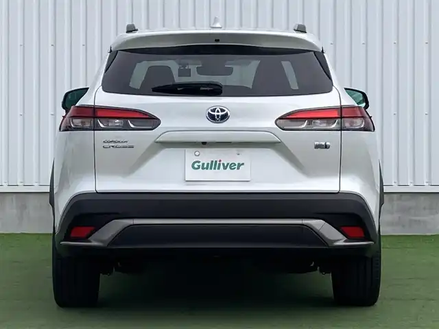 トヨタ カローラ クロス ハイブリッド Z 香川県 2023(令5)年 1.2万km プラチナホワイトパールマイカ ワンオーナー/トヨタセーフティー/・プリクラッシュ/・LTA/純正9インチDA/パノラマルーフ/バックカメラ/ハーフレザーシート/パワーシート/シートヒーター/パワーバックドア/革巻きステアリング/ステアリングリモコン/レーダークルーズ/BSM/LEDライト/スマートキー