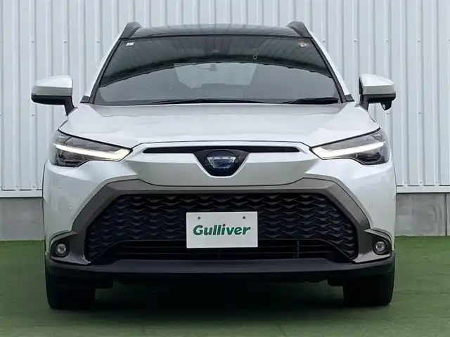 トヨタ カローラ クロス ハイブリッド Z 香川県 2023(令5)年 1.2万km プラチナホワイトパールマイカ ワンオーナー/トヨタセーフティー/・プリクラッシュ/・LTA/純正9インチDA/パノラマルーフ/バックカメラ/ハーフレザーシート/パワーシート/シートヒーター/パワーバックドア/革巻きステアリング/ステアリングリモコン/レーダークルーズ/BSM/LEDライト/スマートキー