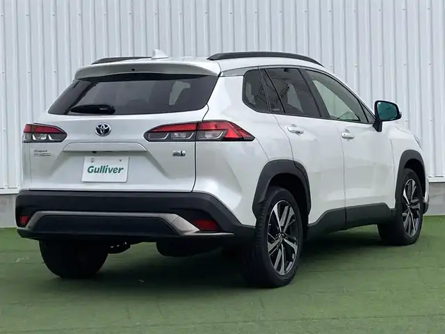 トヨタ カローラ クロス ハイブリッド Z 香川県 2023(令5)年 1.2万km プラチナホワイトパールマイカ ワンオーナー/トヨタセーフティー/・プリクラッシュ/・LTA/純正9インチDA/パノラマルーフ/バックカメラ/ハーフレザーシート/パワーシート/シートヒーター/パワーバックドア/革巻きステアリング/ステアリングリモコン/レーダークルーズ/BSM/LEDライト/スマートキー