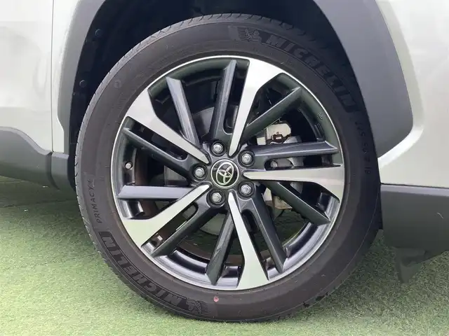 トヨタ カローラ クロス ハイブリッド Z 香川県 2023(令5)年 1.2万km プラチナホワイトパールマイカ ワンオーナー/トヨタセーフティー/・プリクラッシュ/・LTA/純正9インチDA/パノラマルーフ/バックカメラ/ハーフレザーシート/パワーシート/シートヒーター/パワーバックドア/革巻きステアリング/ステアリングリモコン/レーダークルーズ/BSM/LEDライト/スマートキー
