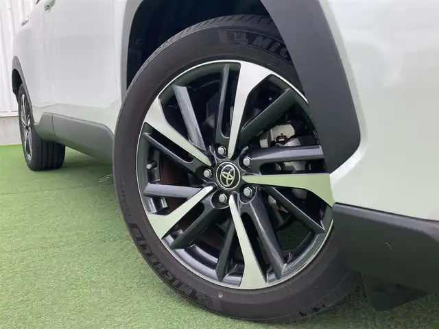 トヨタ カローラ クロス ハイブリッド Z 香川県 2023(令5)年 1.2万km プラチナホワイトパールマイカ ワンオーナー/トヨタセーフティー/・プリクラッシュ/・LTA/純正9インチDA/パノラマルーフ/バックカメラ/ハーフレザーシート/パワーシート/シートヒーター/パワーバックドア/革巻きステアリング/ステアリングリモコン/レーダークルーズ/BSM/LEDライト/スマートキー