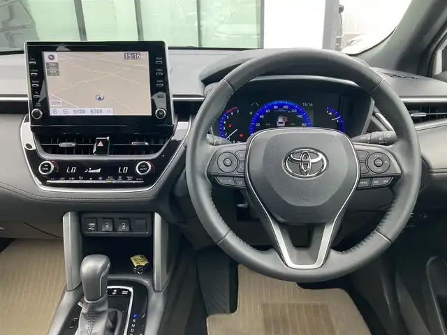 トヨタ カローラ クロス ハイブリッド Z 香川県 2023(令5)年 1.2万km プラチナホワイトパールマイカ ワンオーナー/トヨタセーフティー/・プリクラッシュ/・LTA/純正9インチDA/パノラマルーフ/バックカメラ/ハーフレザーシート/パワーシート/シートヒーター/パワーバックドア/革巻きステアリング/ステアリングリモコン/レーダークルーズ/BSM/LEDライト/スマートキー