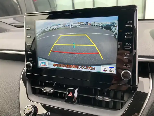 トヨタ カローラ クロス ハイブリッド Z 香川県 2023(令5)年 1.2万km プラチナホワイトパールマイカ ワンオーナー/トヨタセーフティー/・プリクラッシュ/・LTA/純正9インチDA/パノラマルーフ/バックカメラ/ハーフレザーシート/パワーシート/シートヒーター/パワーバックドア/革巻きステアリング/ステアリングリモコン/レーダークルーズ/BSM/LEDライト/スマートキー