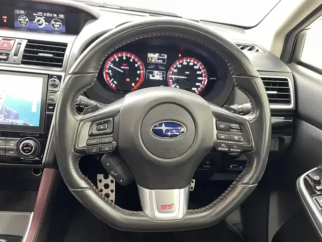 スバル レヴォーグ 2．0STIスポーツアイサイト 熊本県 2017(平29)年 9万km ダークグレーメタリック 禁煙車　/STIフロントエアロ　/純正ナビ（ＣＤ・ＤＶＤ・フルセグ・ＢＴ・ＳＤ・ＵＳＢ）/社外前後ドライブレコーダー　/バックカメラ　/ビルトインＥＴＣ　/後ろのみクリアランスソナー/レーダークルーズコントロール　/ブラインドスポットモニター/衝突軽減ブレーキ/レーンキープアシスト/横滑り防止/前席シートヒーター/前席パワーシート/純正フロアマット/純正１８インチAW/オートライト/LEDヘッドライト/フォグランプ/スマートキー/プッシュスタート/スペアキー1本