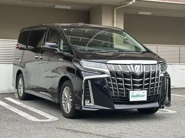 トヨタ アルファードハイブリット SR Cパッケージ 大阪府 2018(平30)年 9.5万km スパークリングブラックパールクリスタルシャイン 法人ワンオーナー/OP:ツインムーンルーフ/OP:T-Connect SDナビ/・AM/FM/CD/DVD/BT/フルセグTV/HDMI/OP:JBLプレミアムサウンド/OP:パノラミックビューモニター/OP:12/1型リアエンターテイメント/OP:デジタルインナーミラー/OP:ブラインドスポットモニター/OP:リアクロストラフィックアラート/OP:2眼LEDヘッドランプ/OP:LEDシーケンシュアル/黒革シート(エグゼクティブシート)/メモリ付きパワーシート/シートヒーター/エアシート/両側電動スライド/電動リアゲート/ドライブレコーダー（DC-DR511）/レーダー探知機（ZERO705V）/トヨタセーフティーセンス/・プリクラッシュセーフティー/・レーントレーシングアシスト/・レーダークルーズコントロール/・ロードサインアシスト/・オートマチックハイビーム/・インテリジェントクリアランスソナー/保証書/取扱説明書/記録簿R1/R2/R3/R4/R5/R6