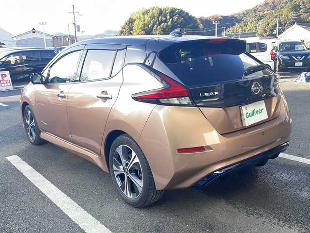 日産 リーフ X Vセレクション 京都府 2021(令3)年 2.7万km オレンジⅡ 純正メモリナビ/アラウンドビューモニター/プロパイロット/ブラインドスポットモニター/インテリジェンスルームミラー/前席シートヒーター/LEDヘッドライト/ビルトインETC/ステアリングヒーター