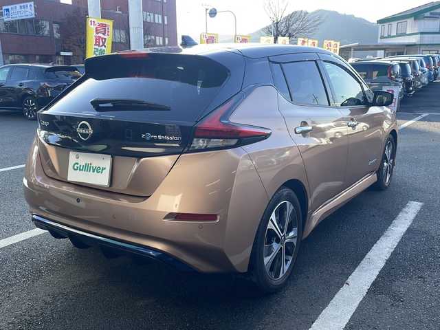 日産 リーフ X Vセレクション 京都府 2021(令3)年 2.7万km オレンジⅡ 純正メモリナビ/アラウンドビューモニター/プロパイロット/ブラインドスポットモニター/インテリジェンスルームミラー/前席シートヒーター/LEDヘッドライト/ビルトインETC/ステアリングヒーター