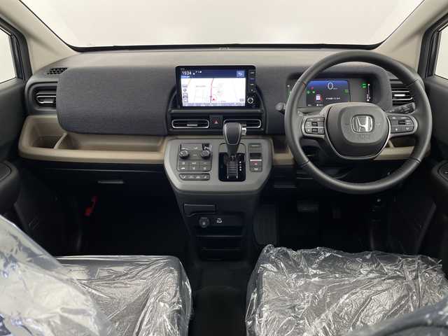 ホンダ フリード ハイブリット e:HEV AIR EX 埼玉県 2025(令7)年 0.1千km メテオロイドグレーメタリック 登録済未使用車/純正メモリナビ/Bluetooth/フルセグ/バックカメラ/両側パワースライドドア/ホンダセンシング/・レーダークルーズコントロール/・レーンキープアシスト/・衝突軽減システム/・誤発進抑制機能/・標識認識機能/前席シートヒーター/ハーフレザーシート/純正１５インチアルミホイール/プッシュスタート/スマートキー/スペアキー